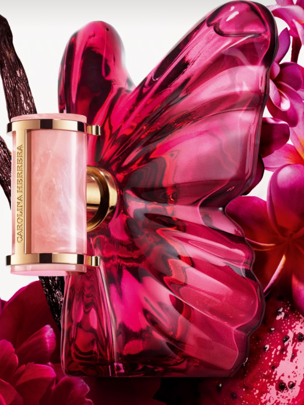 Carolina Herrera Vibrant Pink Butterfly Body Oil Bottle with Gold Accents